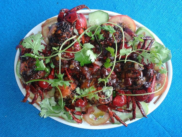 sesarma mederi and tamarind stir-fried can tho cuisine in vietnam